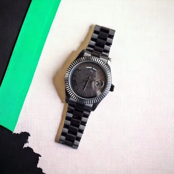 ROLEX OYSTER PERPETUAL DAY/DATE BLACK STAINLESS STEEL WATCH