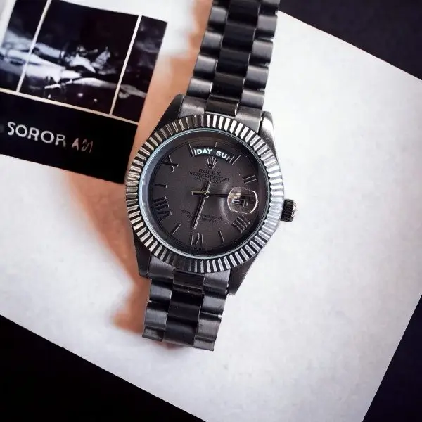 ROLEX OYSTER PERPETUAL DAY/DATE BLACK STAINLESS STEEL WATCH